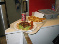 Chips with sausage mushy peas & gravey Newcastle-under-Lyme